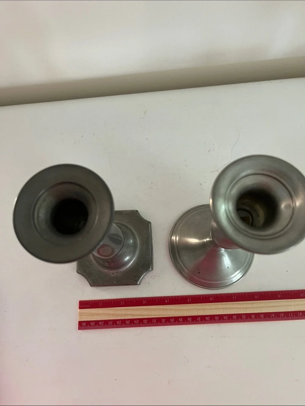 Unmatched set of 2 8 inch pewter candlesticks no visible markings
